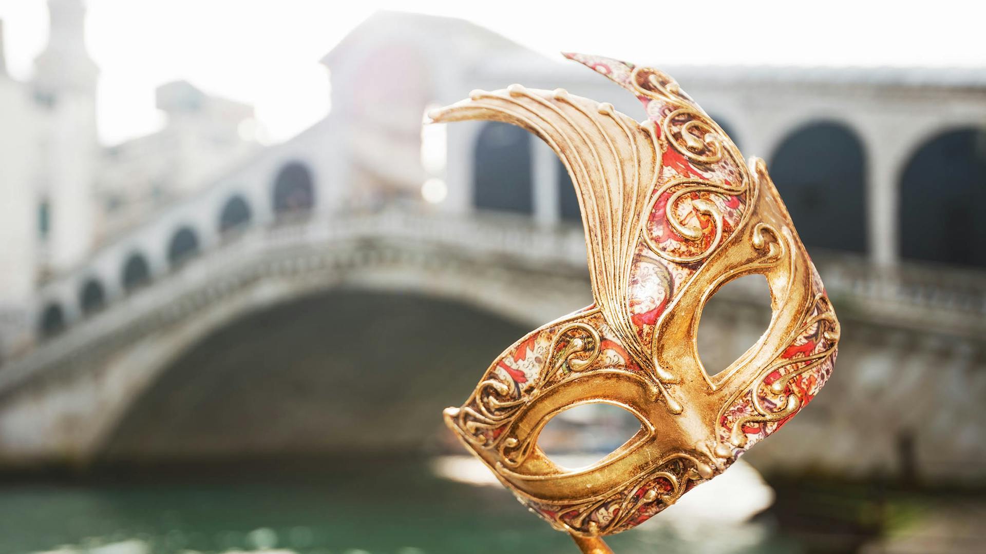 Mask in the front of Rialto Bridge Venice